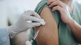 Patient Receiving a Vaccine Shot in Arm