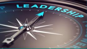 Image with compass and the word "leadership"