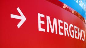 An arrow pointing to the word emergency.