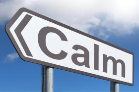 sign that says calm 